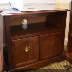 F29. Mahogany media cabinet. 29”h x 32”w x 18”d - $75 